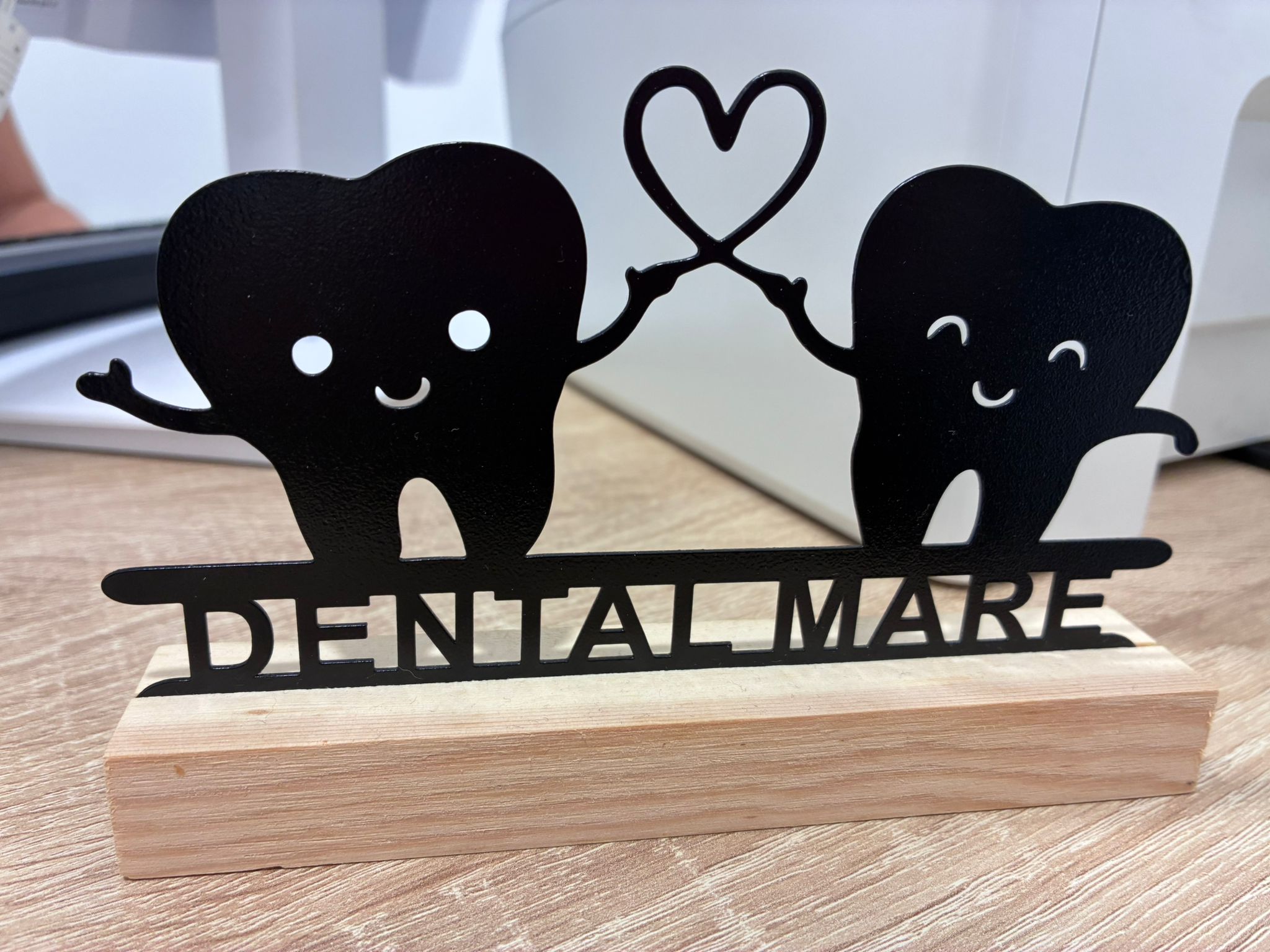 Decoración de Dental Mare con dos dientes